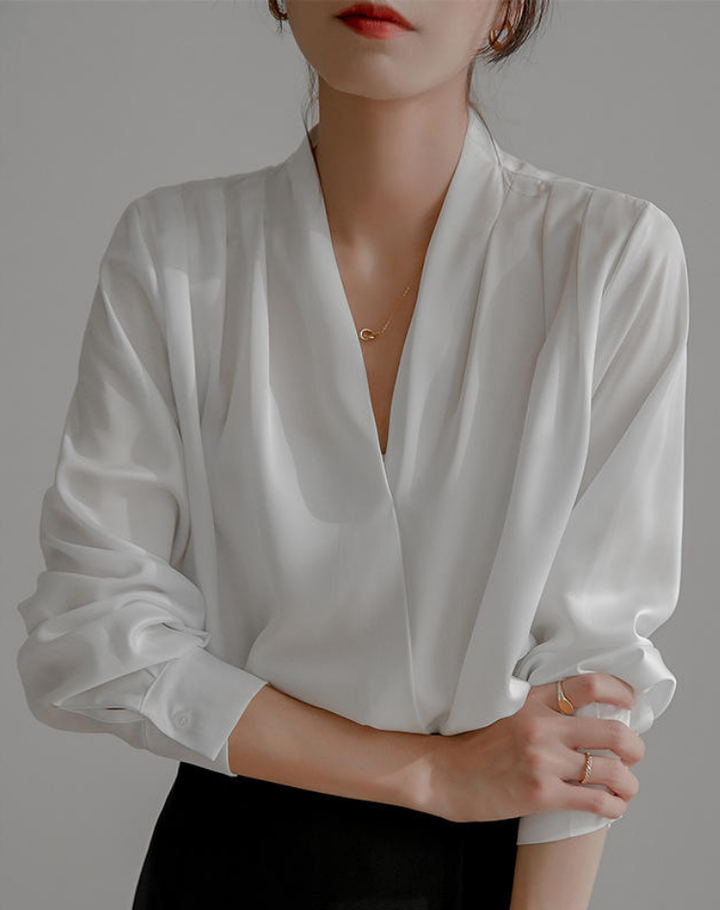 Elegant satin wrap blouse with V-neck and puff sleeves