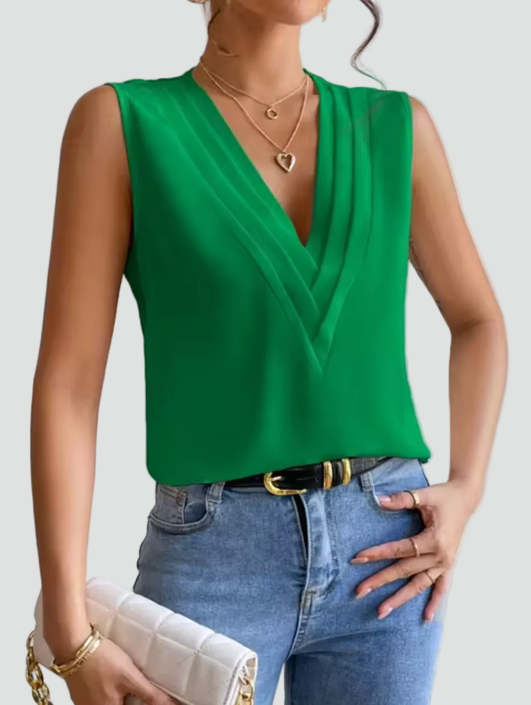 Elegante mouwloze blouse met overslaghalslijn
