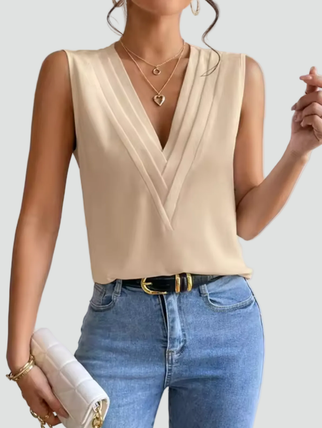 Elegante mouwloze blouse met overslaghalslijn