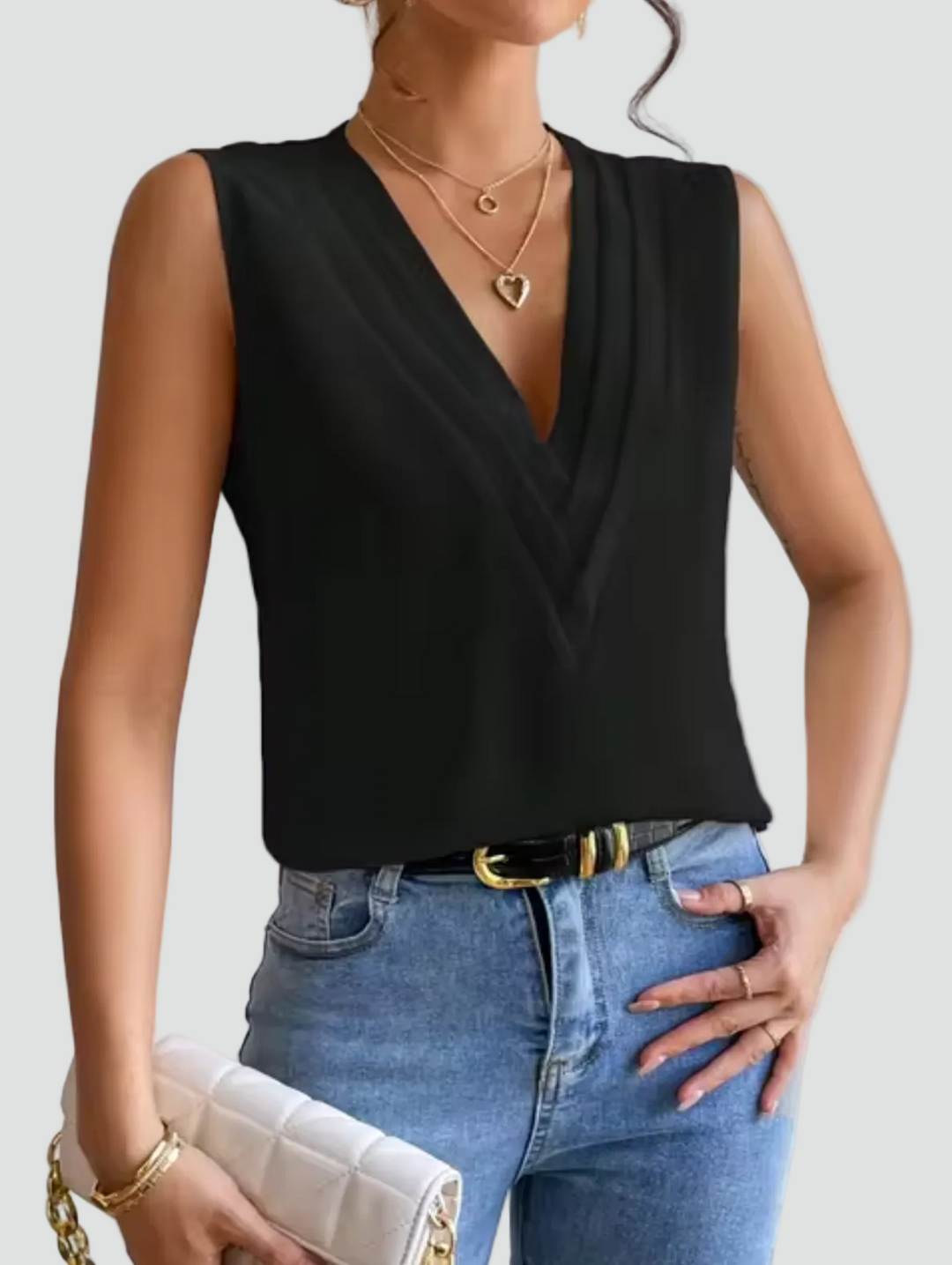 Elegante mouwloze blouse met overslaghalslijn