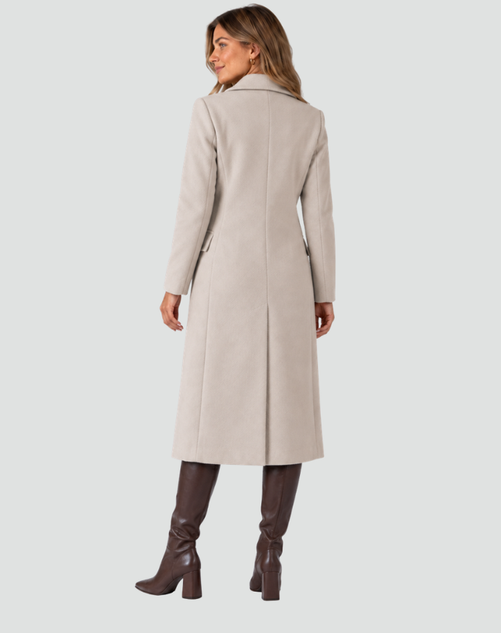 Long manteau féminin à double rangée en laine avec revers et coupe cintrée