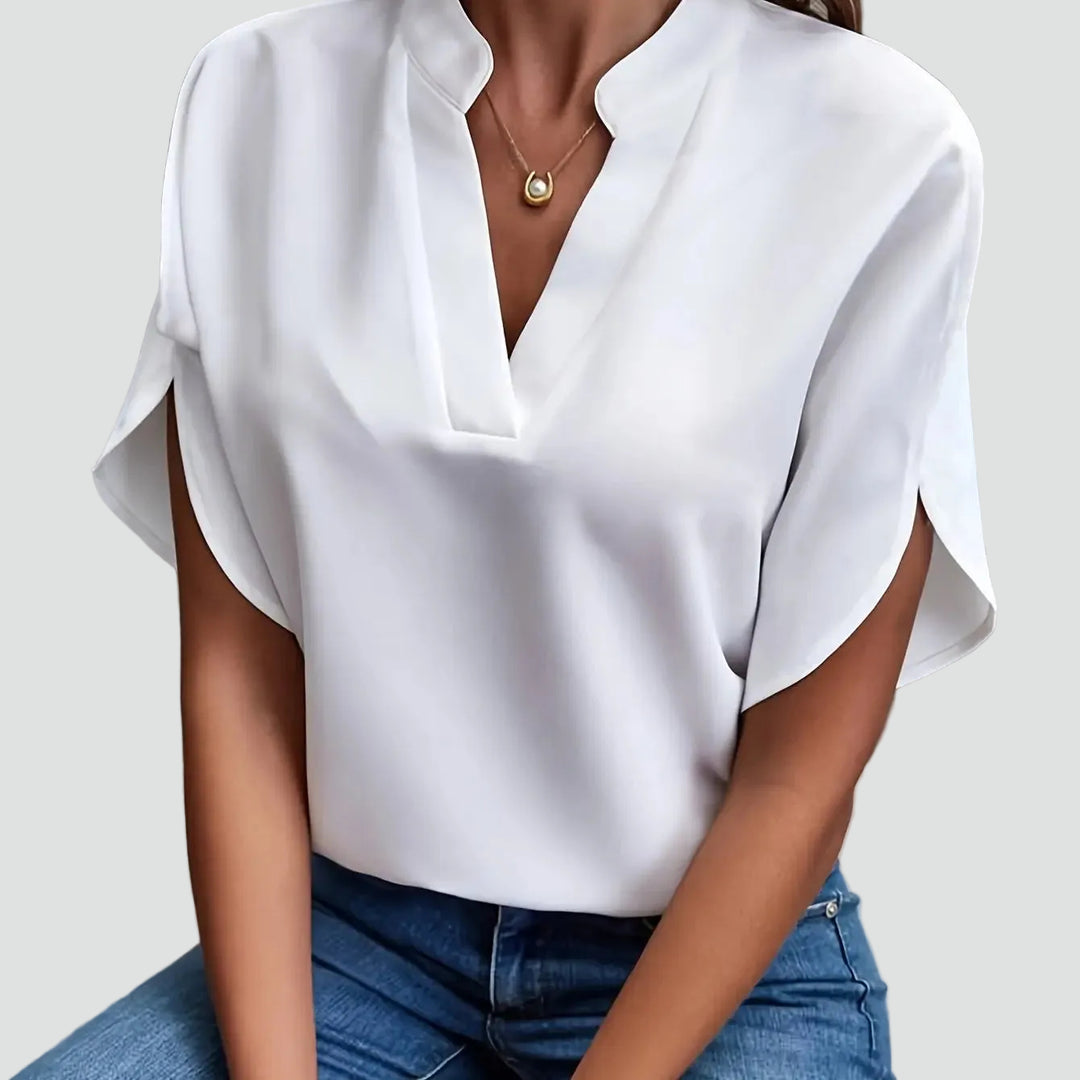 Blouse élégante pour femme avec col montant et décolleté en V, manches papillon