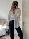 Oversized damesblouse met pailletten en lange mouwen voor feestjes