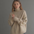 Warm women's cashmere-blend oversized turtleneck sweater