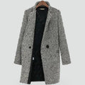 Elegant women's houndstooth coat with quilted lining