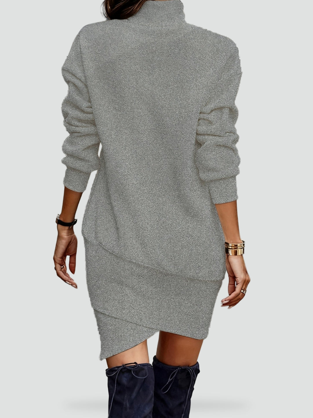 Knitted mini dress with a turtleneck and an asymmetrical hemline
