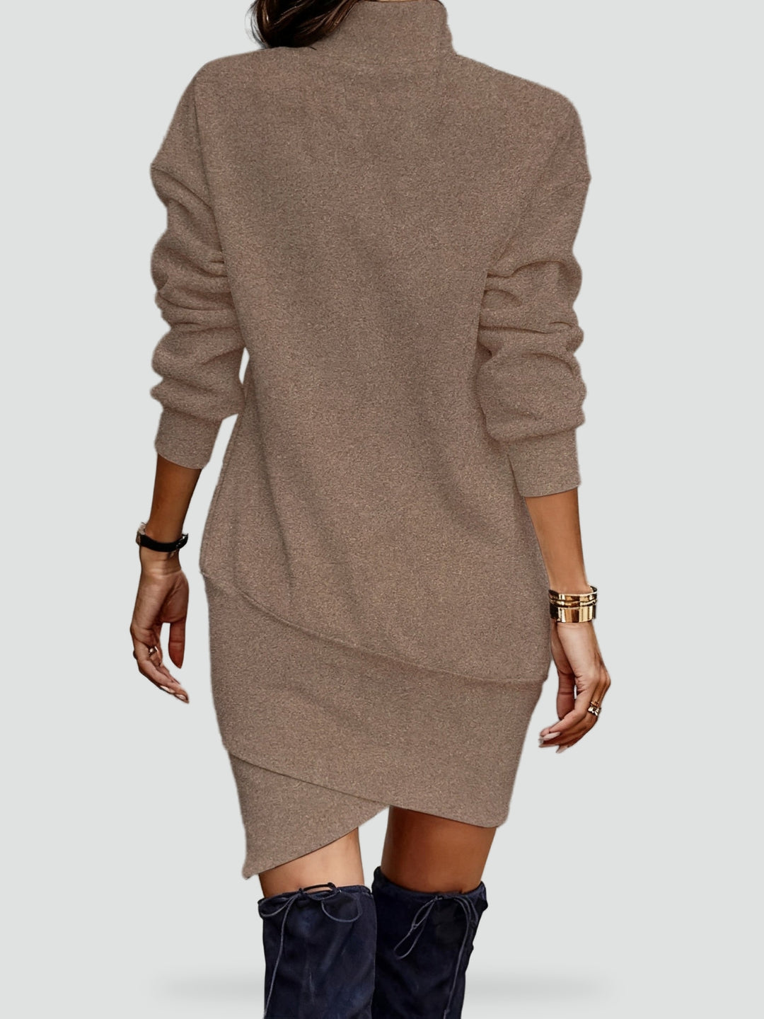 Knitted mini dress with a turtleneck and an asymmetrical hemline