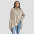 Loose women's turtleneck sweater with an asymmetrical hem
