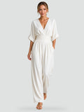 Jumpsuit met wijde pijpen en een riem in de taille voor een perfecte getailleerde look