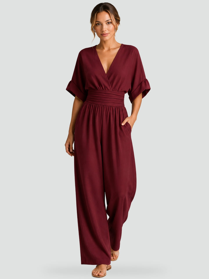 Jumpsuit met wijde pijpen en een riem in de taille voor een perfecte getailleerde look