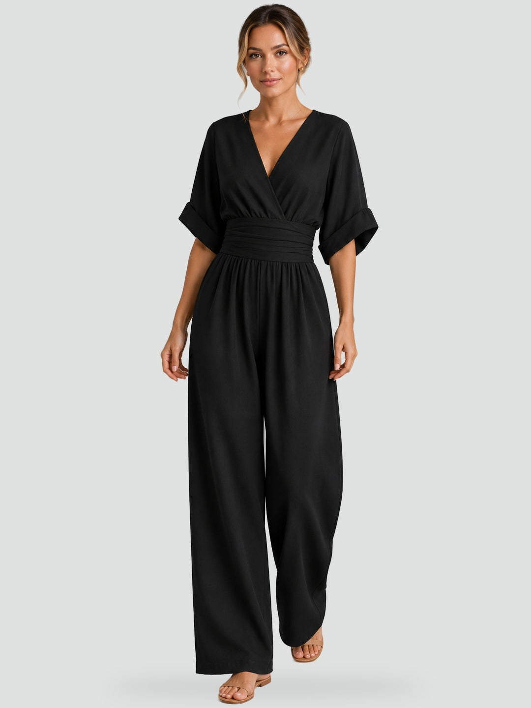Jumpsuit met wijde pijpen en een riem in de taille voor een perfecte getailleerde look