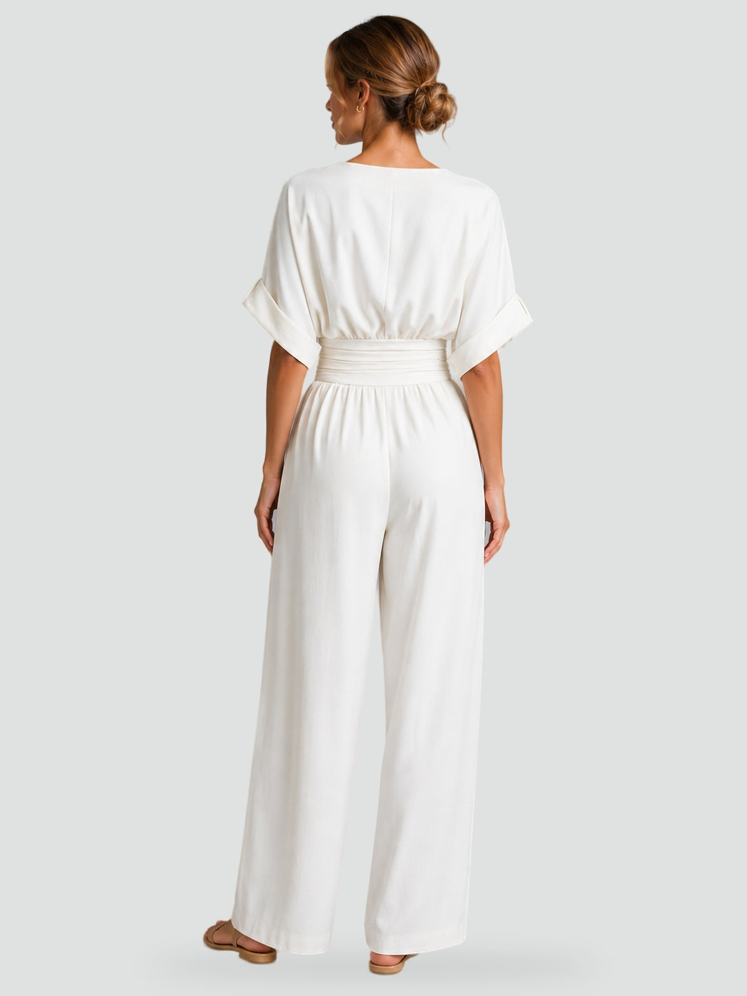 Jumpsuit met wijde pijpen en een riem in de taille voor een perfecte getailleerde look