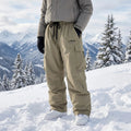 Losse baggy dames skibroek met cargozakken
