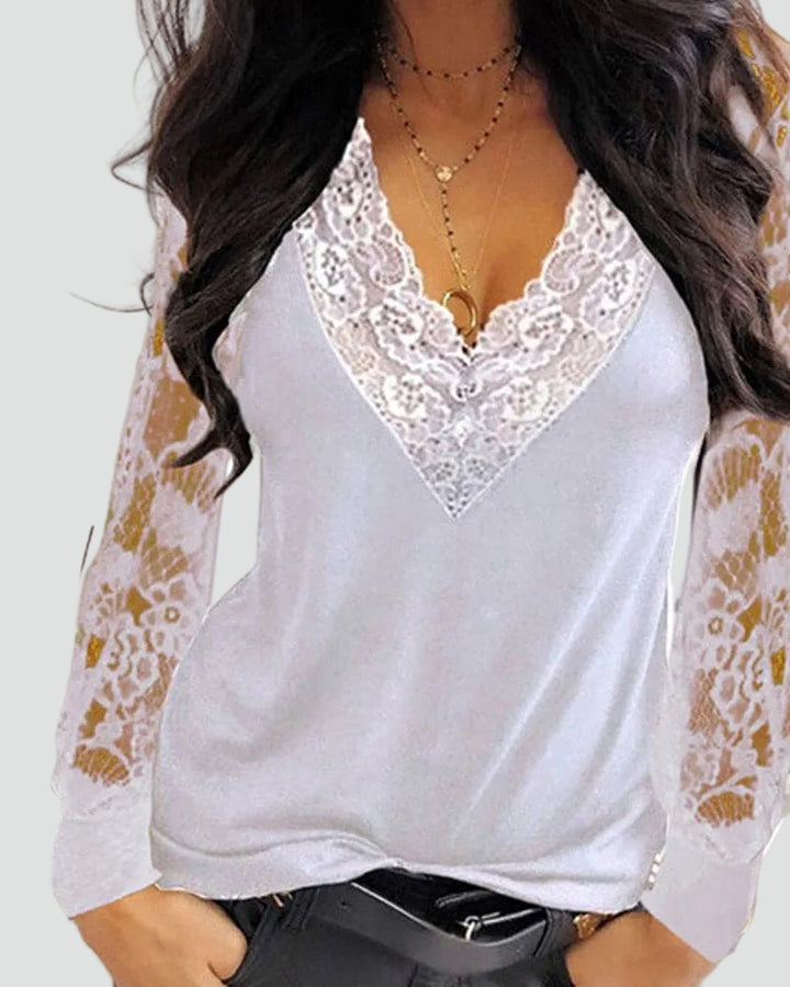 Elegante dames kanten blouse met V-hals en lange mouwen
