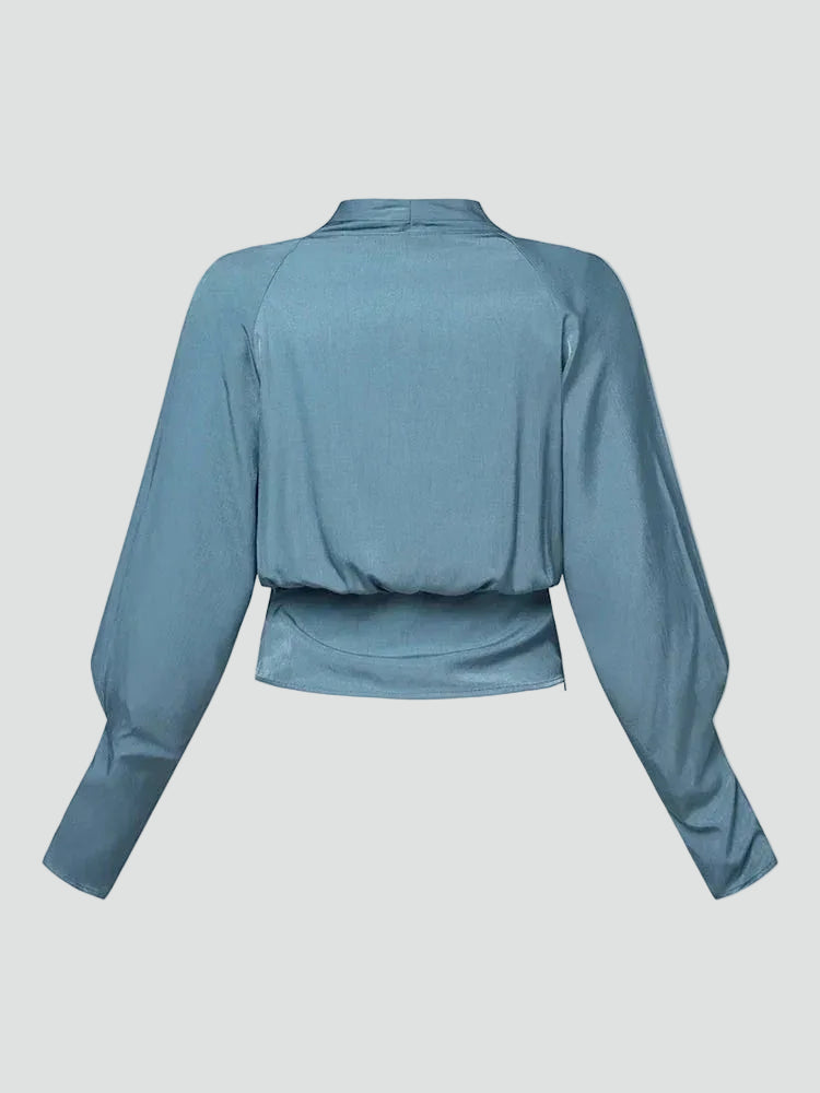 Blouse cache-cœur en satin élégante avec col en V et manches bouffantes