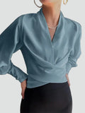 Elegant satin wrap blouse with V-neck and puff sleeves