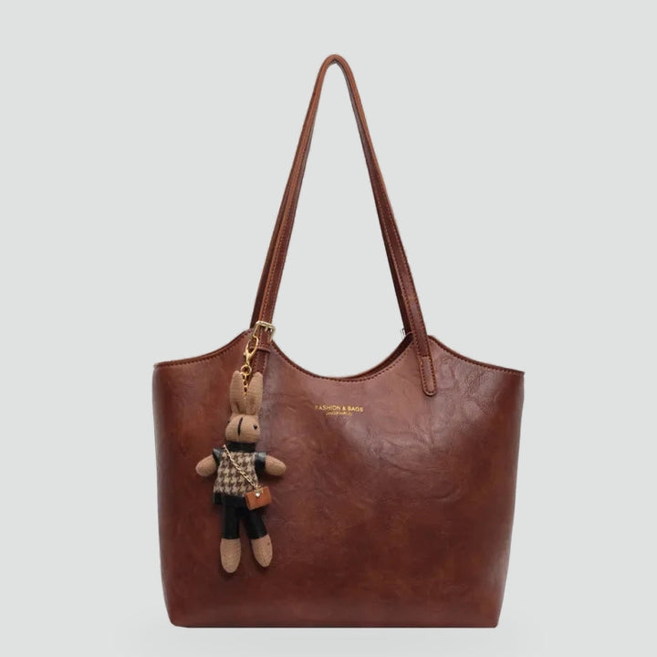 Dameshandtas met afneembare hanger en leren randafwerking