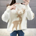 Pull de Noël femme avec un renne et des flocons de neige